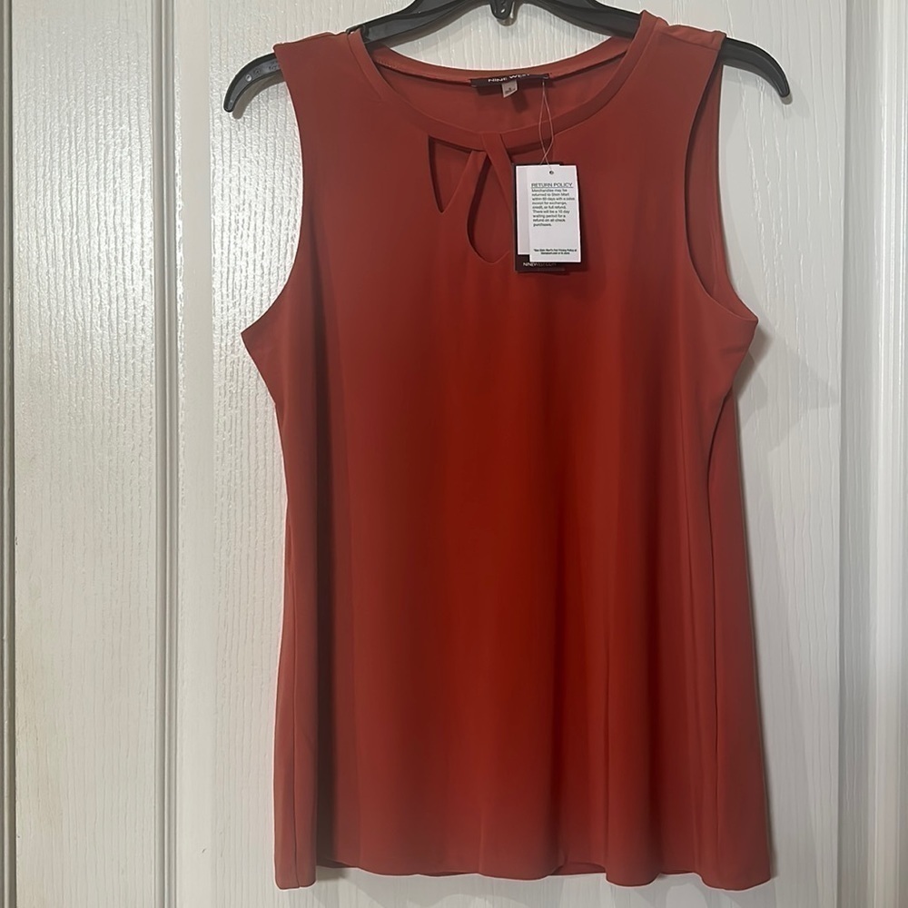Nine West size small, burnt orange sleeveless top with cut out neckline